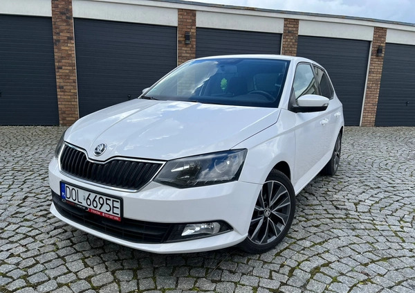 Skoda Fabia cena 28700 przebieg: 135000, rok produkcji 2015 z Syców małe 79